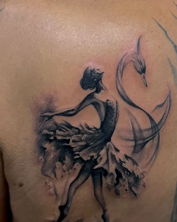 Black and grey ballerina in a soft wash style, on a shoulder blade